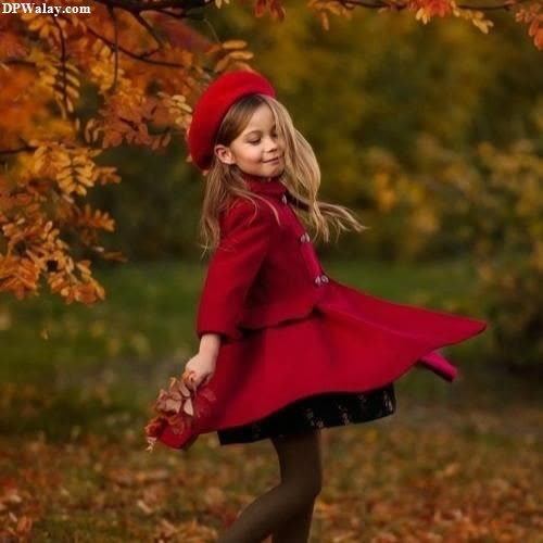 a little girl in a red coat and hat baby pic for whatsapp dp 