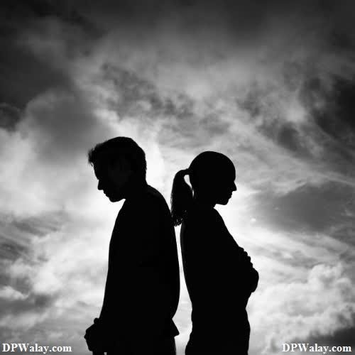 two people standing in front of a cloudy sky images by DPwalay
