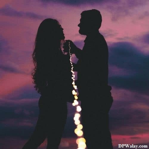love dp for instagram - a couple standing in front of a sunset