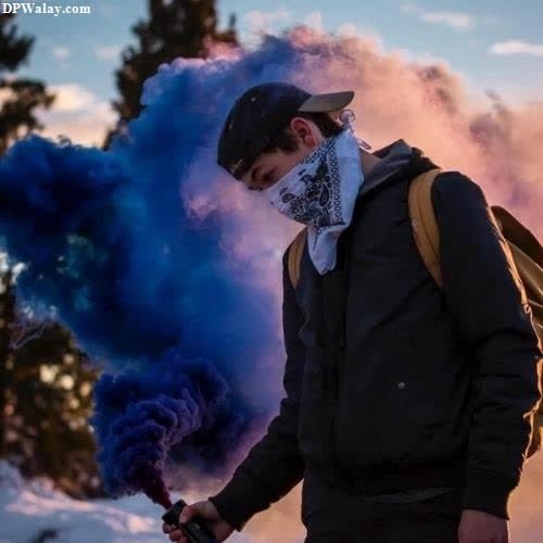 a man with a backpack and a blue smoke bomb-RwpM