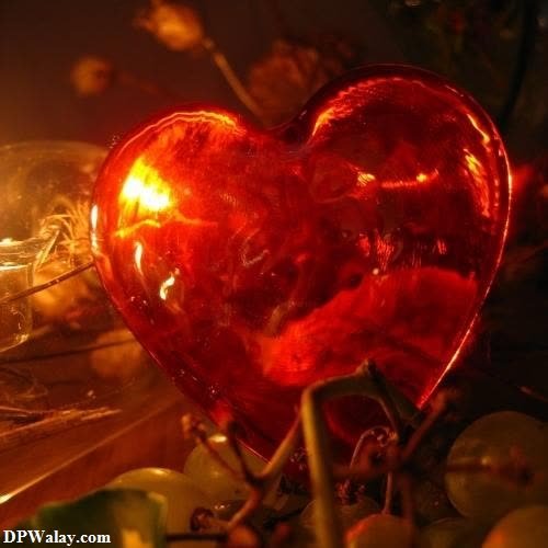 a heart shaped light in the dark
