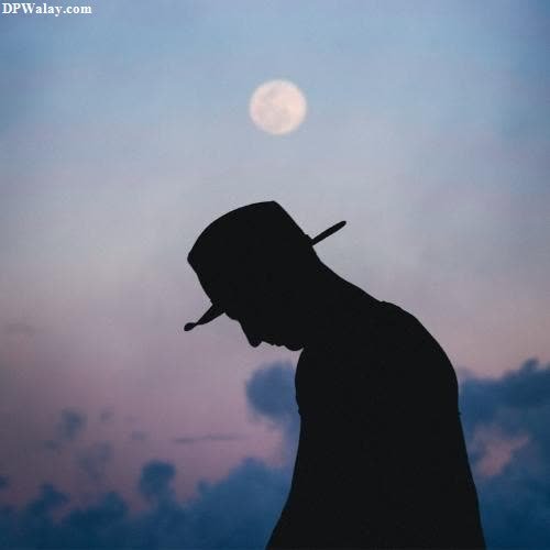 a silhouette of a man with a hat and a cigarette in his mouth-5tj3 
