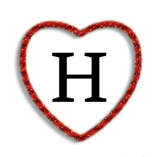 a heart shaped frame with the letter h images by DPwalay