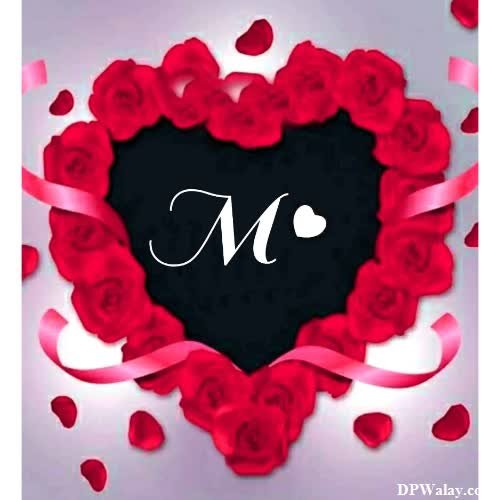 a heart shaped frame with the letter m in it