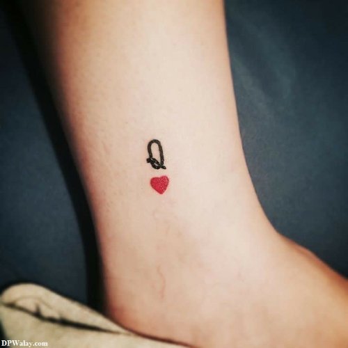a small heart tattoo on the ankle-yfbM 