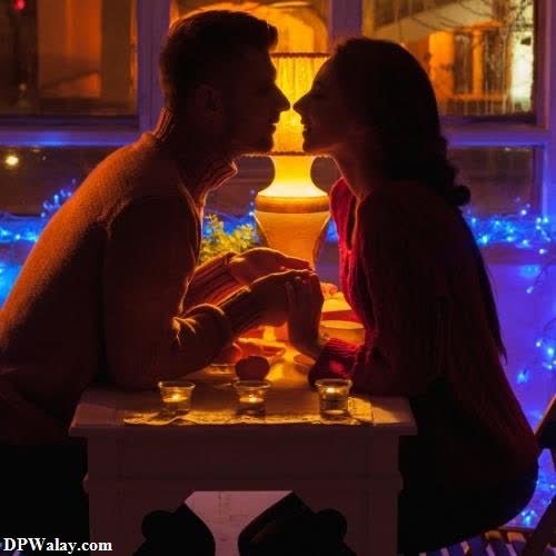 a man and woman sitting at a table with a candle romantic bengali caption for fb dp 