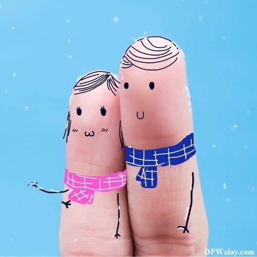 a couple holding hands in the snow-iqv0